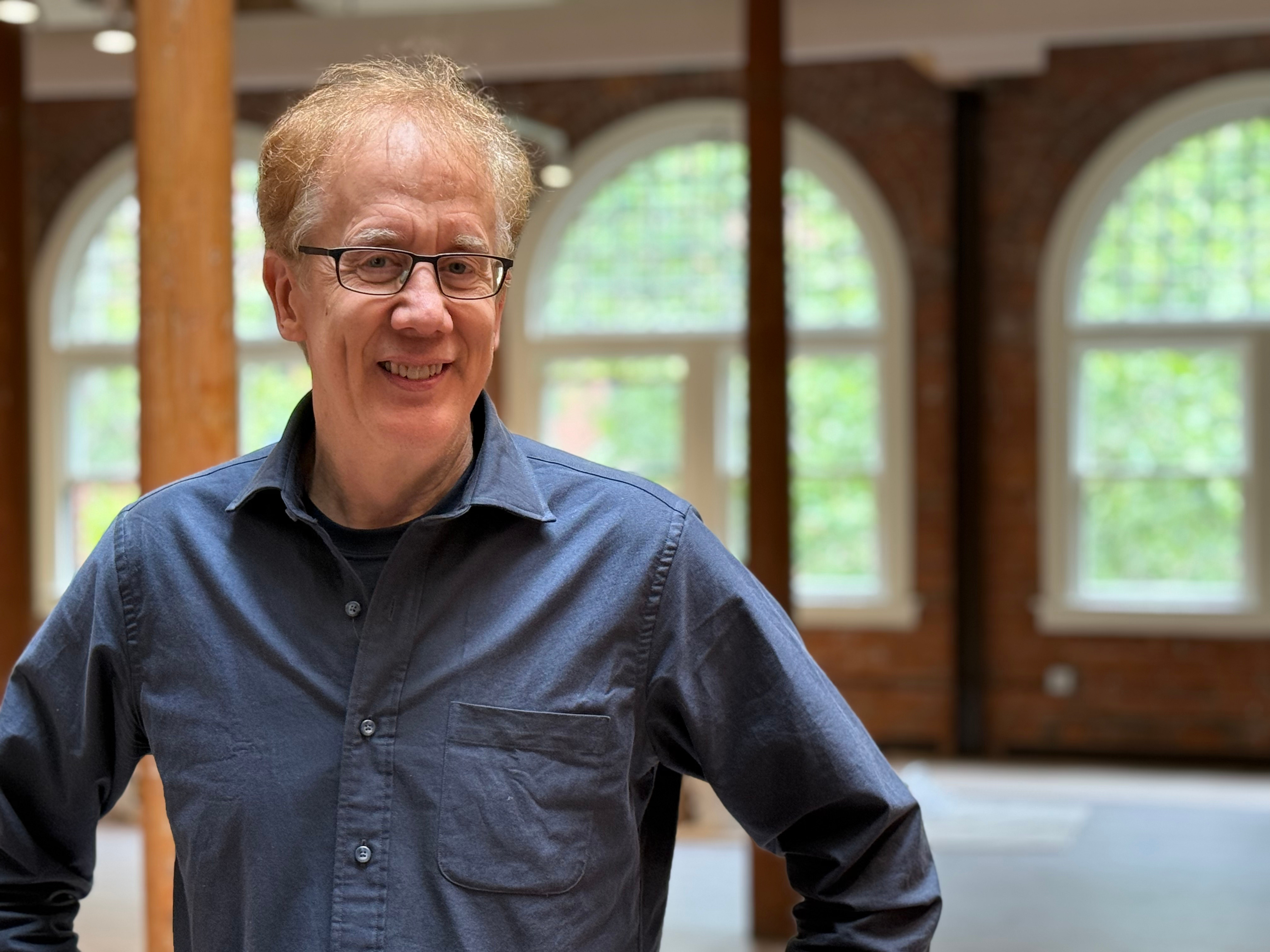 Andrew Conru in the occidental space with natural lighting