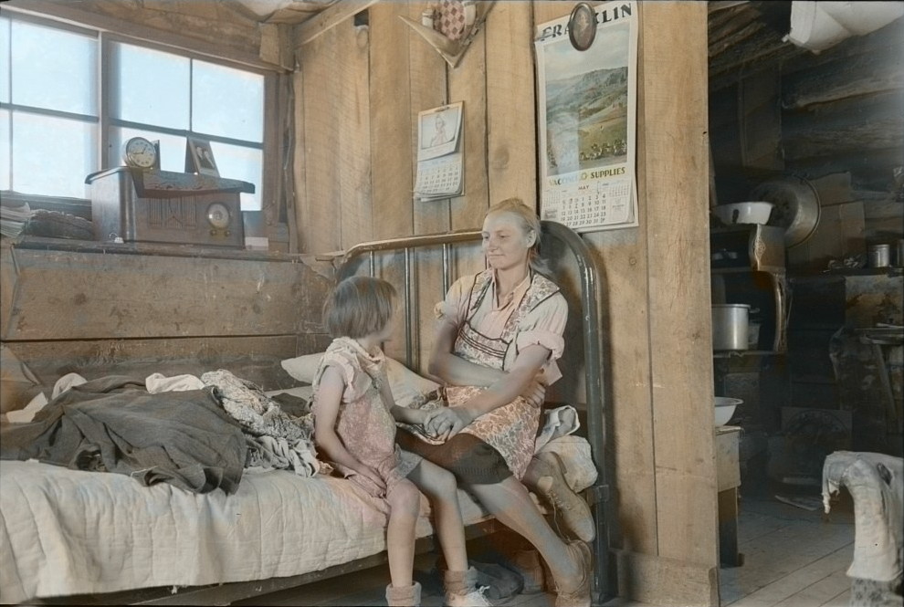 Woman and child listening to the radio, 1940